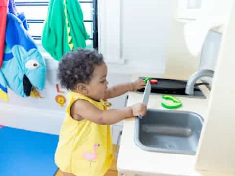 a child playing with a toy