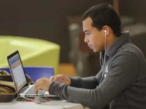 a man using a laptop