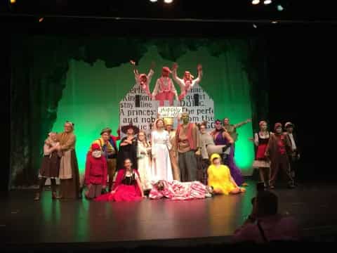 a group of people on a stage