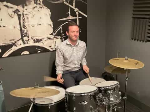 a person playing drums