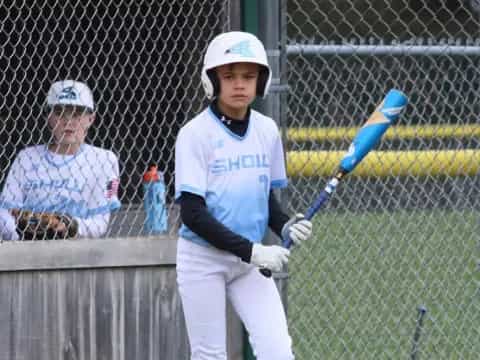 a young boy playing baseball