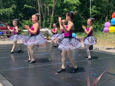 a group of girls dancing