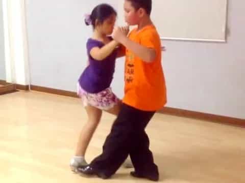 a man and a woman dancing