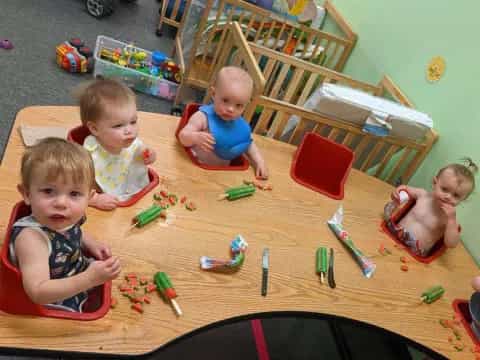 a group of kids playing with toys