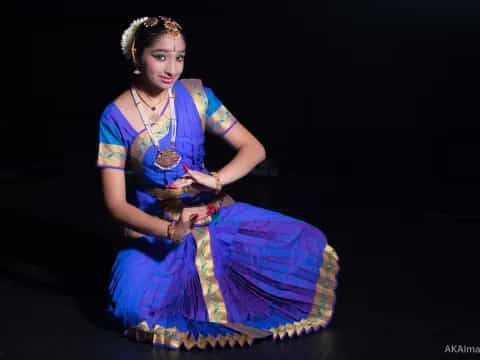 a person in a blue dress