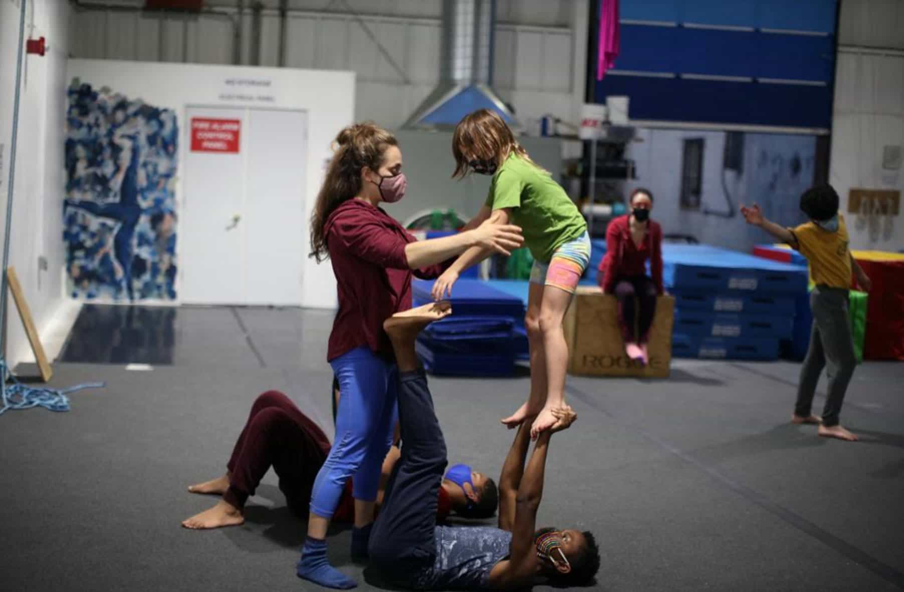 a group of people doing yoga