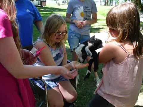 a group of people with a dog