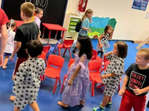 a group of children in a classroom