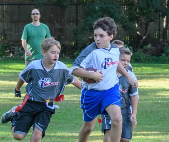 a group of boys playing football