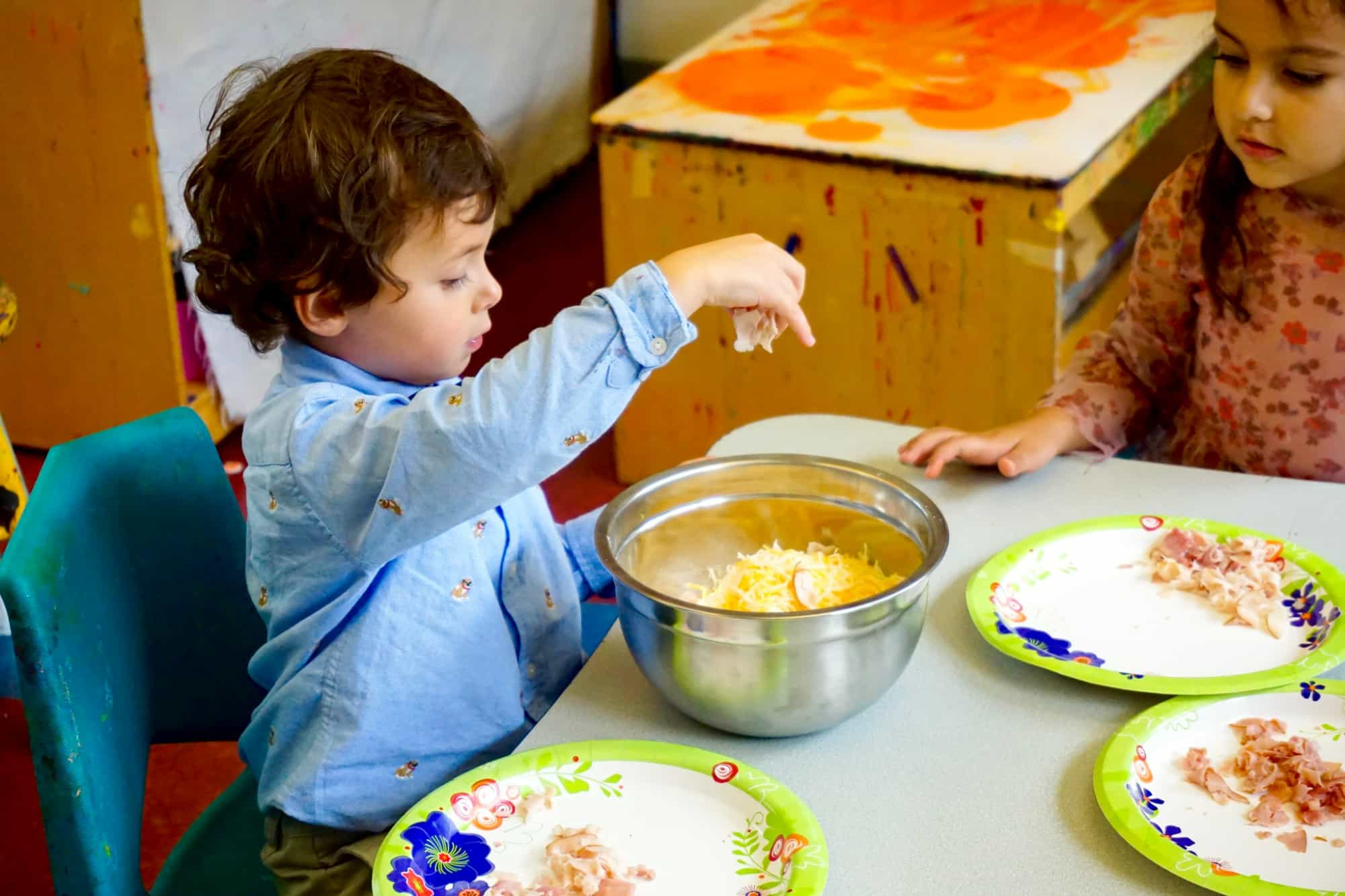 a couple of kids eating
