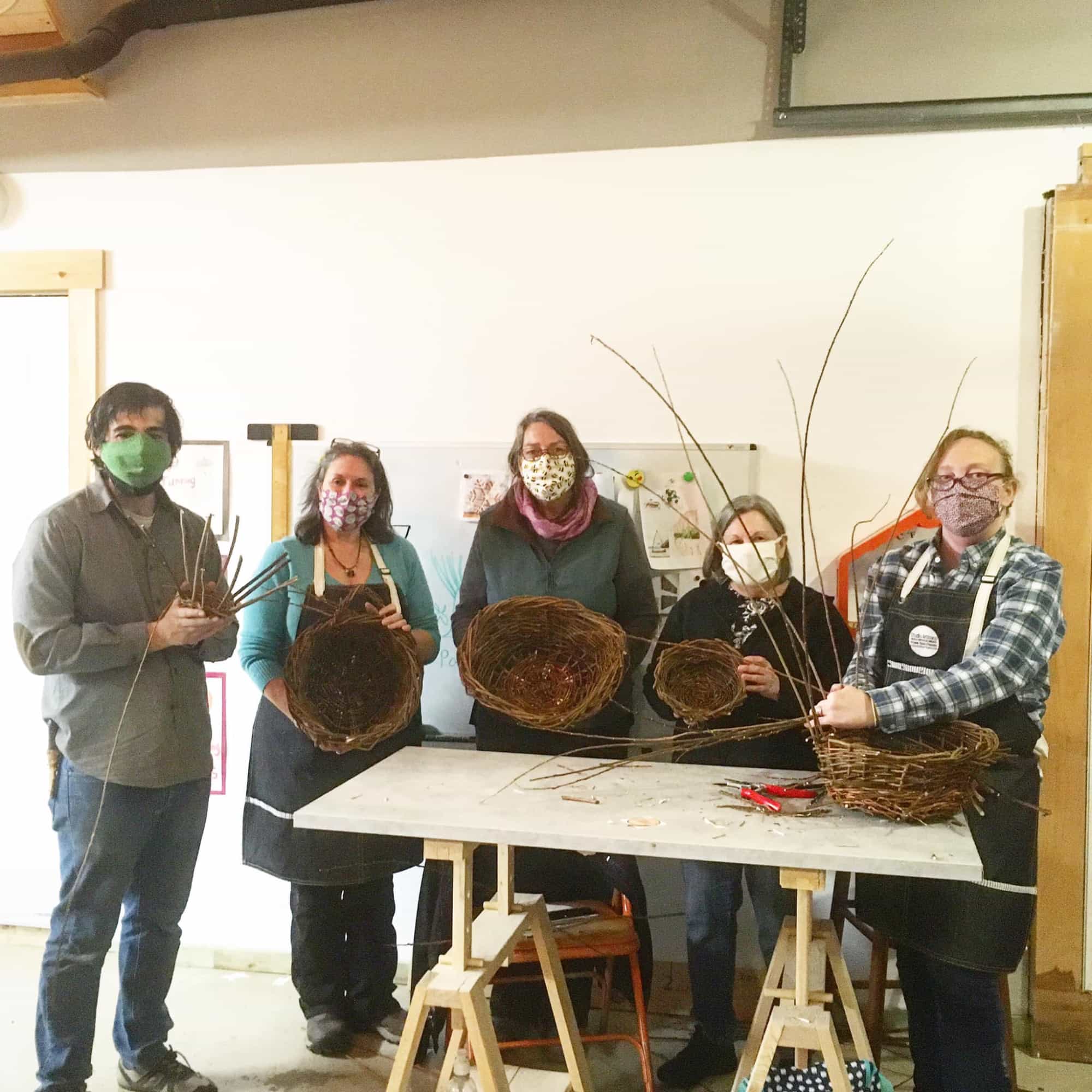 a group of people wearing masks