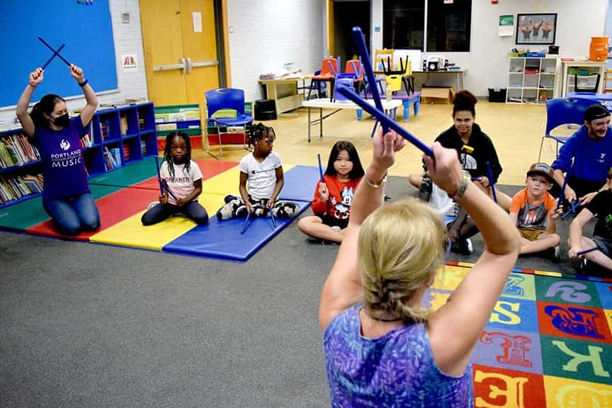 a group of people in a classroom