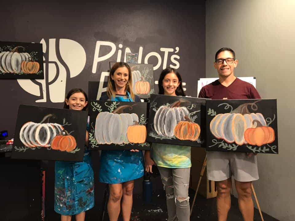 a group of people holding up posters