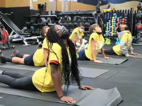a group of people in a gym