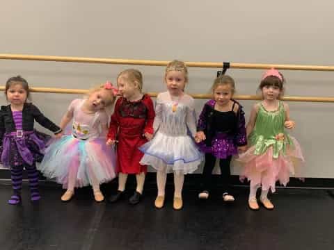 a group of children in clothing