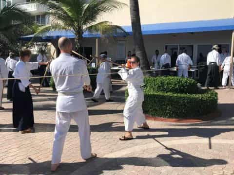 a group of people in white robes