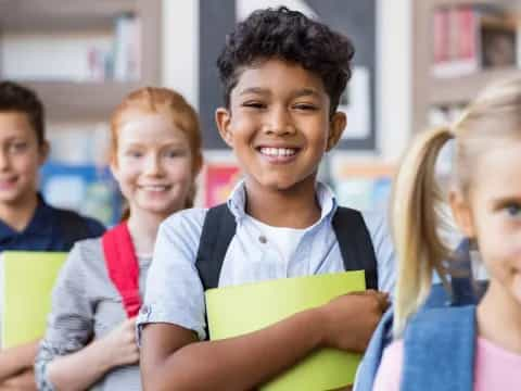 a group of children smiling