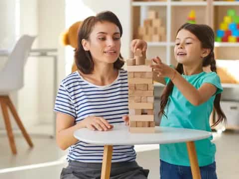 a few young girls holding a paper