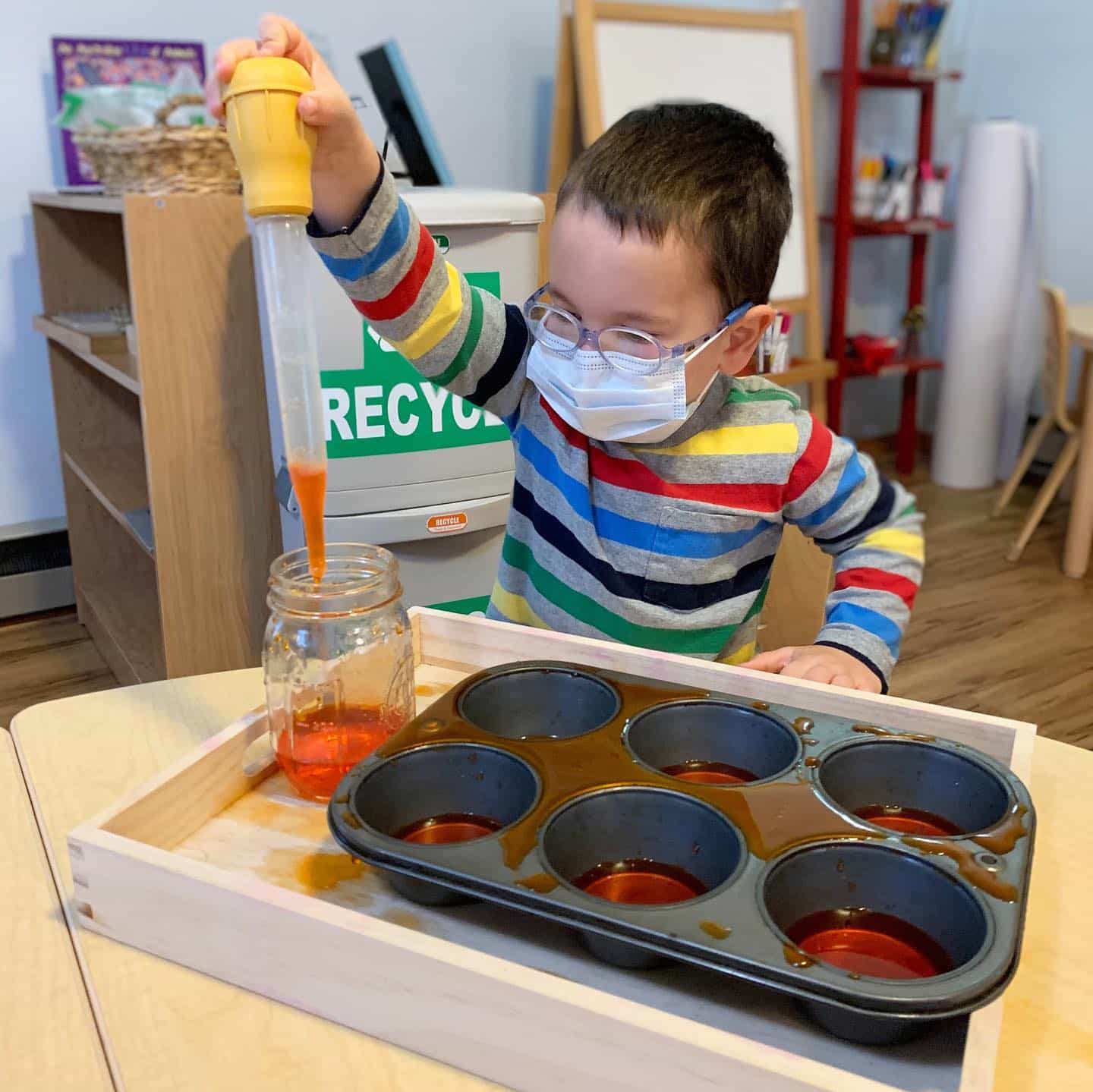 a child wearing a safety goggles