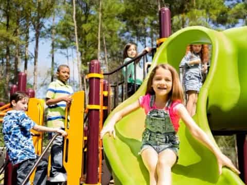 a group of kids on a playground