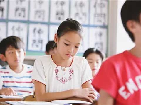 a group of children in a classroom