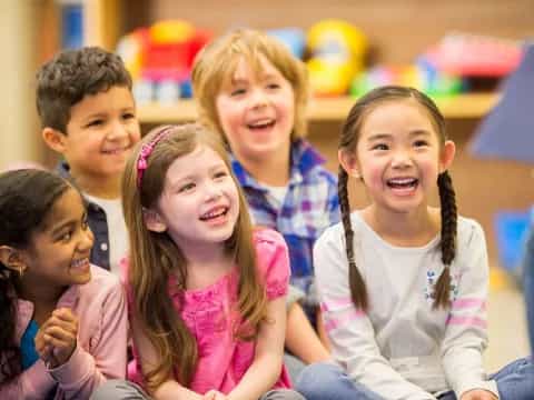 a group of children smiling