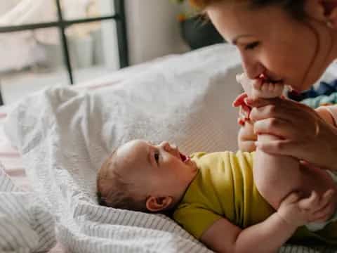 a person holding a baby
