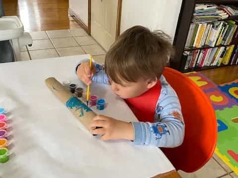 a child sitting at a table