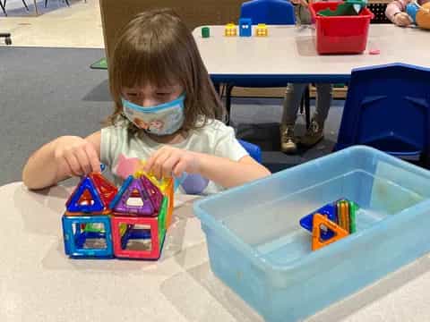 a child playing with toys