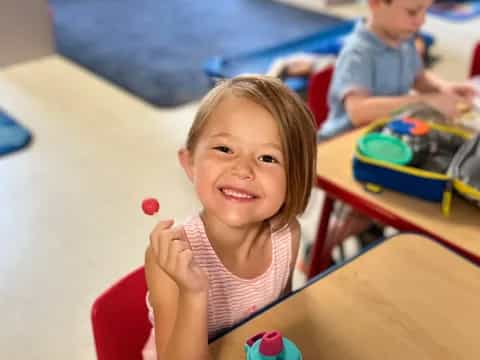 a couple of kids playing with toys