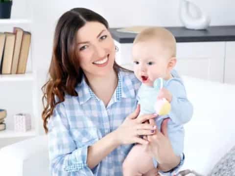 a person holding a baby