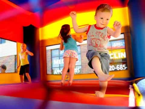 a boy jumping in the air