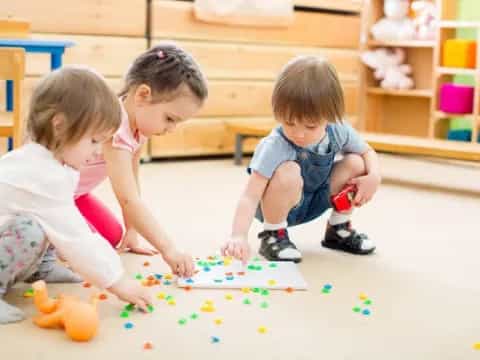 a couple of kids playing with toys