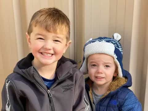 a boy and girl smiling