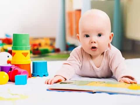 a baby crawling on a table