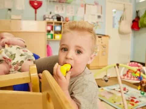 a boy eating a banana