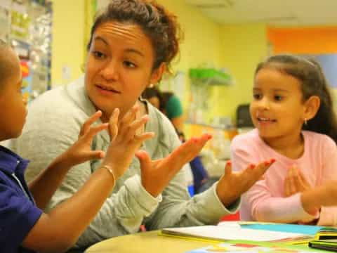 a person and a few children