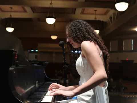a person playing a piano