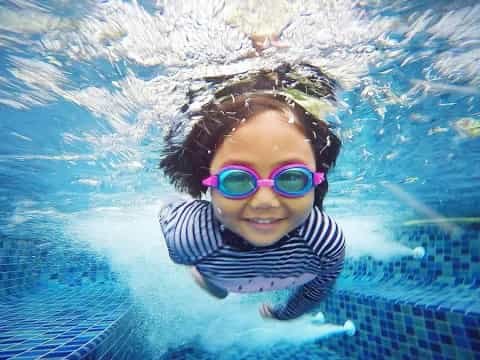 a child in a pool