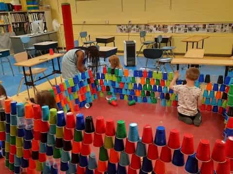 a group of kids playing with toys