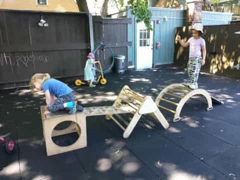 kids playing with wooden blocks