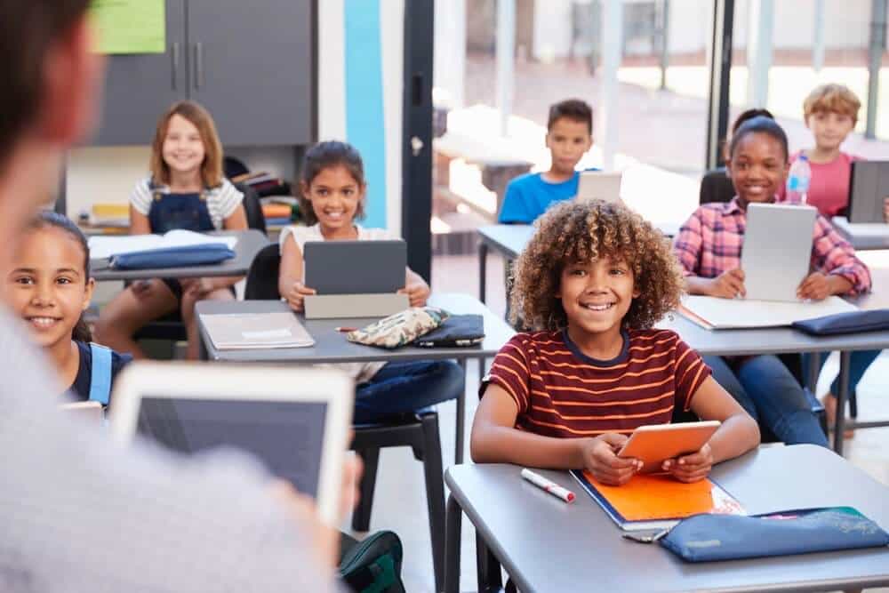 a group of children in a classroom