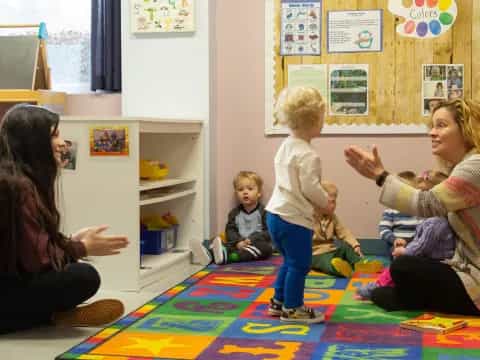 a group of people sitting on a bed