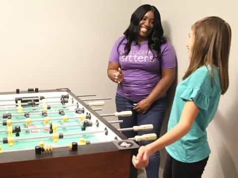 a couple of women playing a game