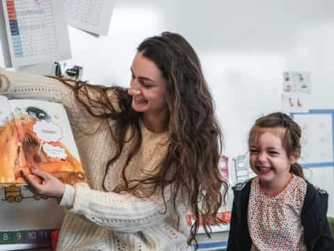 a person holding a painting
