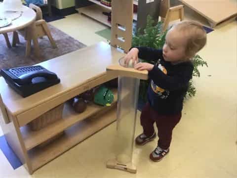 a child playing with a toy