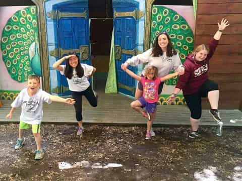 a group of people jumping in the air