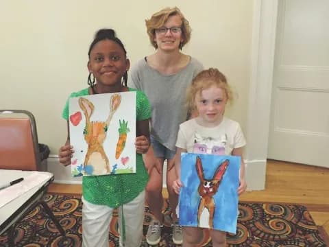 a group of people holding a sign