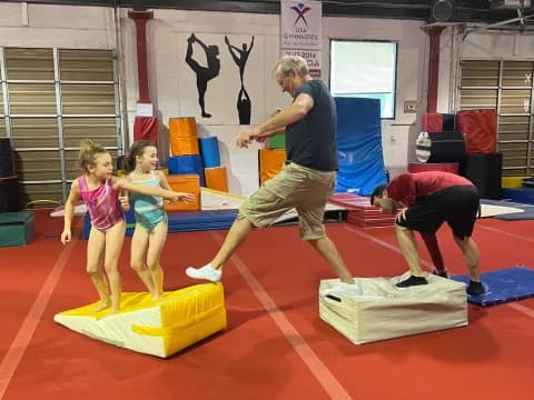 a group of people playing on mats