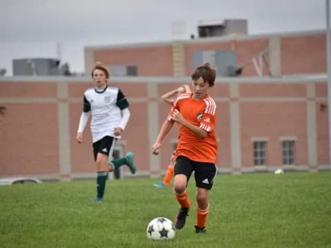a group of girls playing football